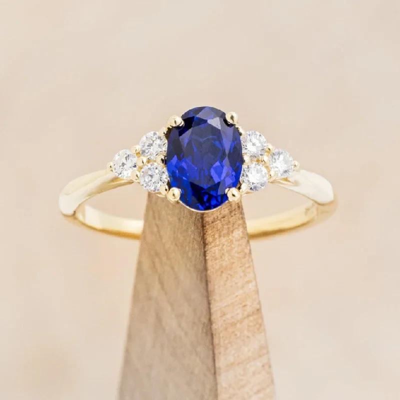 "RHEA" - OVAL CUT LAB-GROWN BLUE SAPPHIRE ENGAGEMENT RING WITH DIAMOND ACCENTS